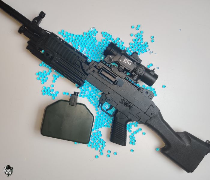 Mitraillette à orbeez M249 noir avec des billes d'orbeez bleues